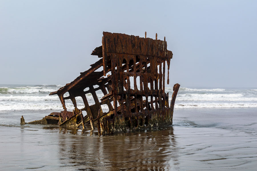 Remnants of the ship wreck draw visitors to the beach
