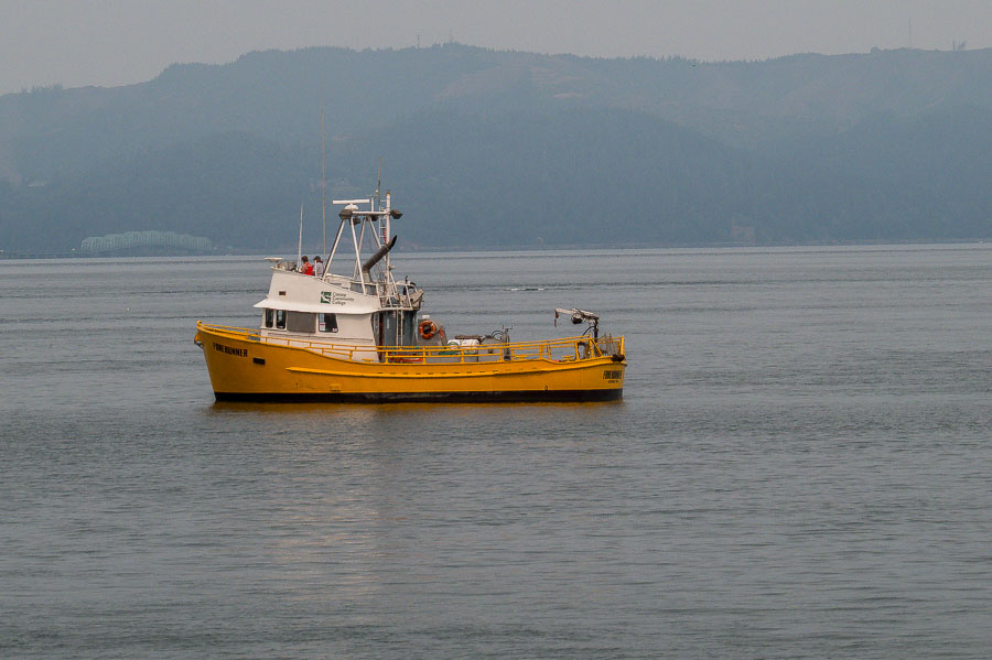Boats busy studying and working along the Columbia River