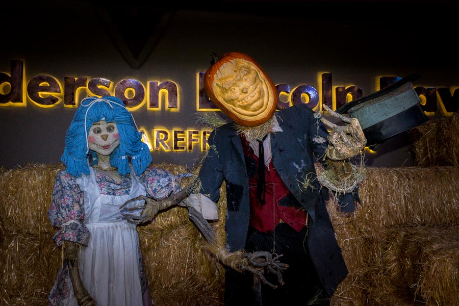 Halloween couple greets visitors on stage
