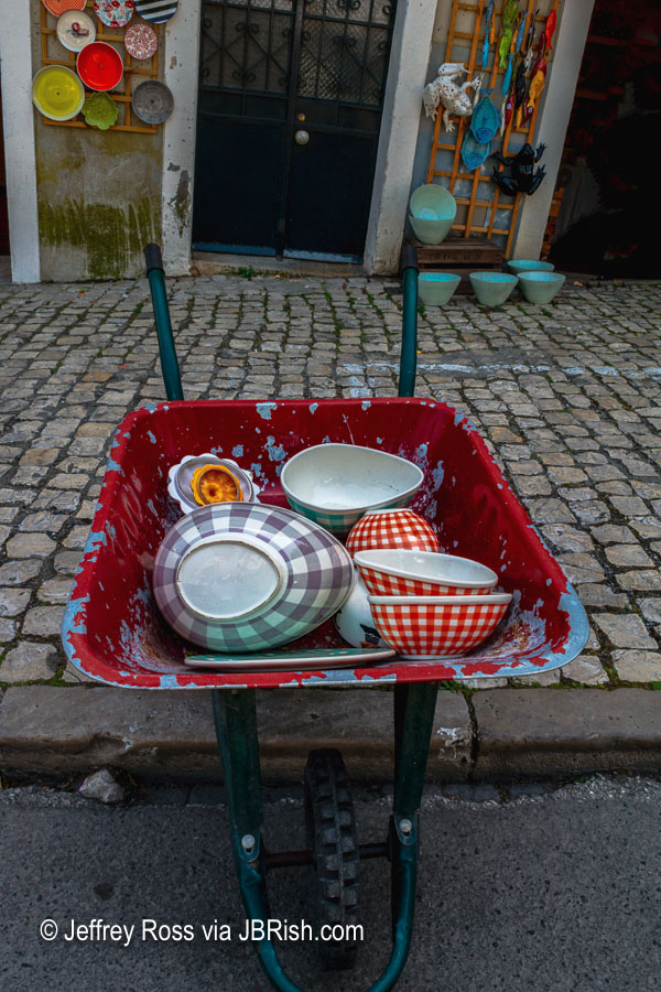 Wheelbarrow with dishes for sale