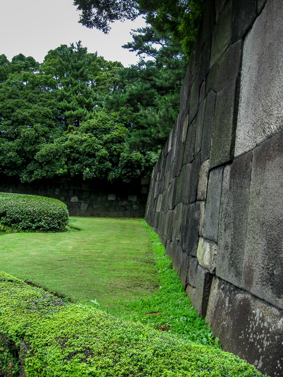 Stone wall surrounding the garden grounds