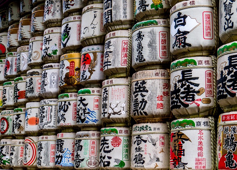 Colorful sake barrels on display
