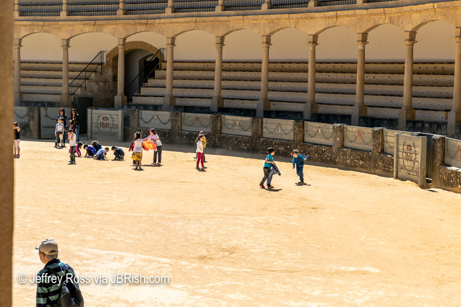 Youngsters acting out a bullfight